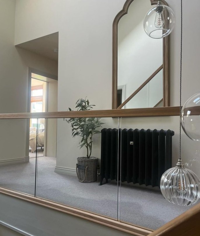 traditional radiator and ornate mirror